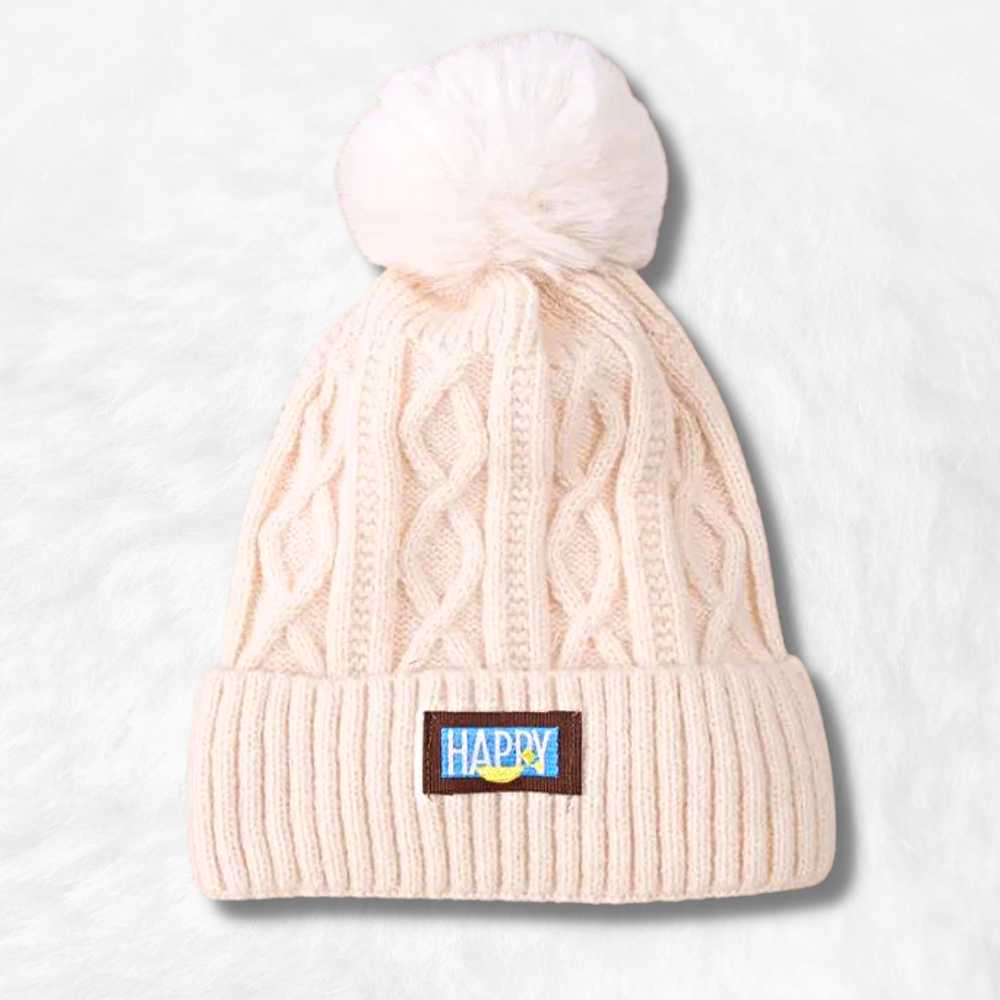 bonnet blanc pompon.