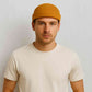 Un homme porte le Bonnet Docker Camel