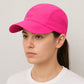 Une femme porte le Casquette Tennis Femme