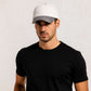 Un homme porte la Casquette Velours Côtelé Bicolore Gris