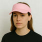 Une femme porte la Casquette Visière Femme