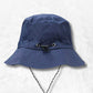 Chapeau de Pluie bleu.