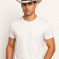 Un homme porte le  Chapeau Cowboy Luxe beige
