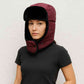Une femme porte le Chapka Ski Mauve
