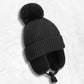 Bonnet Cache Oreille Noir à Pompon pour Enfant de côté